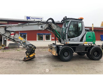 Grävmaskin på däck NEW HOLLAND