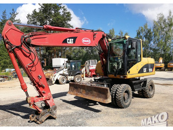 Grävmaskin på däck CATERPILLAR M315C