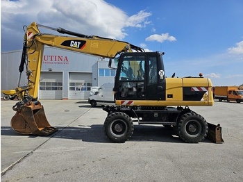 Grävmaskin på däck CATERPILLAR M315D