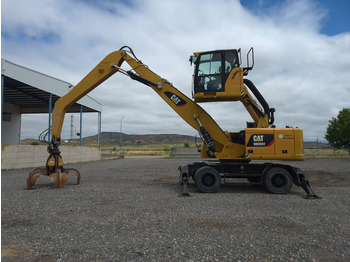 Grävmaskin på däck CATERPILLAR MH3022