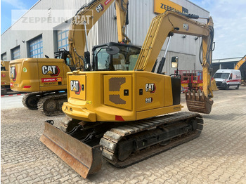 Minigrävmaskin Cat 310: bild 4