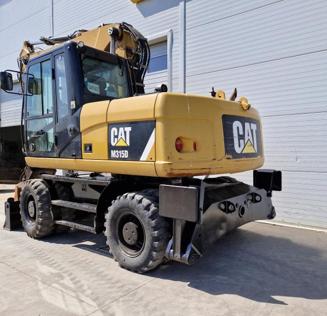 Grävmaskin på däck CATERPILLAR M315: bild 6